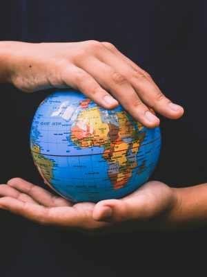 hand-holding-globe-for-earth-day-campaign-U3C3WAY
