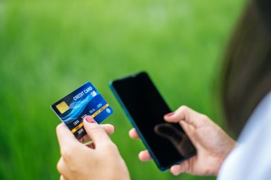Payment for goods by credit card via smartphone.
